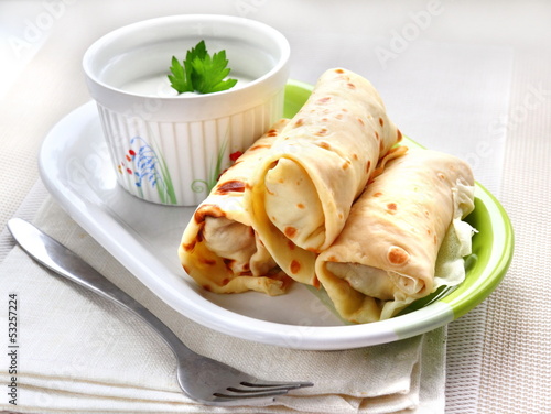 Photo: Stuffed creppes with sour cream Stuffed creppes with sour cream