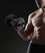 Exercising biceps with dumbbells