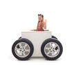 Foto: Travel concept with little girl and wheeled box Travel concept with little girl and wheeled box