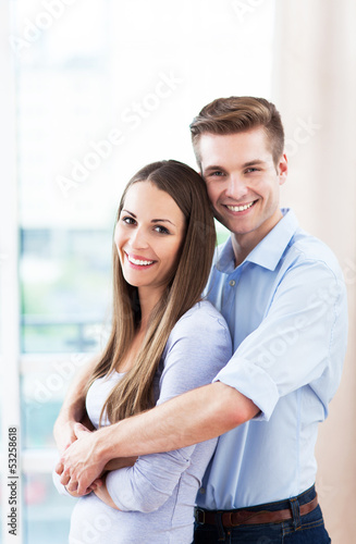 Photo: Young couple hugging Young couple hugging