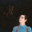Photo: Nerd geek businessman student teacher angel devil chalk decision Nerd geek businessman student teacher angel devil chalk decision