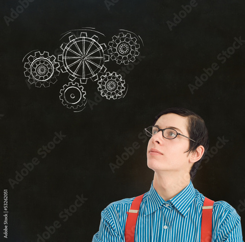 Photo: Nerd geek businessman student teacher chalk thinking gears cogs Nerd geek businessman student teacher chalk thinking gears cogs