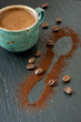 Photo: Cup of coffee, coffee beans and ground coffee Cup of coffee, coffee beans and ground coffee