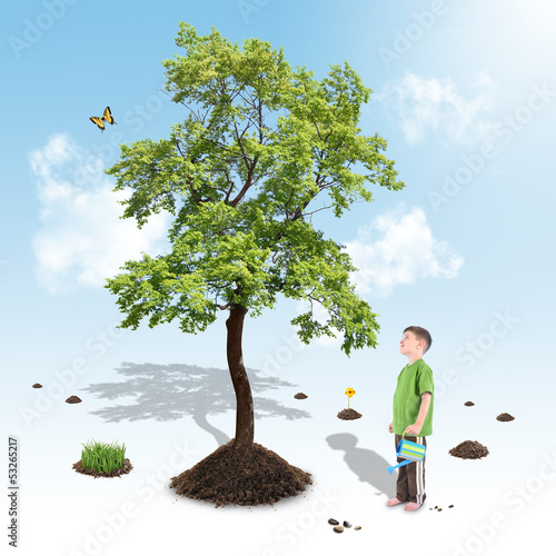 Photo: Boy Growing Nature Tree in White Garden Boy Growing Nature Tree in White Garden