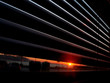 window blind with view of last rays of sun