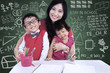 Happy family posing in class