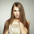 Foto: Photo of beautiful young woman in white jacket Photo of beautiful young woman in white jacket