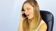 Woman laughing like crazy on the phone
