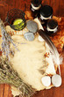 Composition with old papers, herbs, stones and bottles with