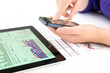 Businesswoman work with documents and tablet pc