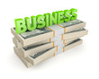 Word BUSINESS and stack of dollars