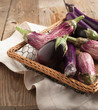 Various Eggplants on wooden table