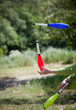 throwing juggling clubs outdoor