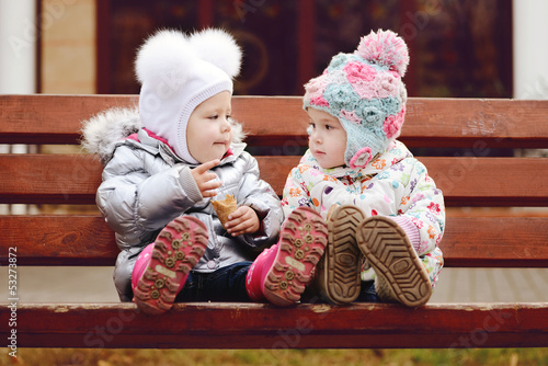 Photo: baby friends on bench baby friends on bench