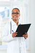 Portrait of young female doctor in clinic