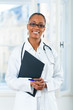 Portrait of young female doctor in clinic