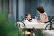 Mother and son having lunch together