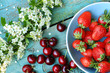 Photo: Fresh organic cherries and strawberries Fresh organic cherries and strawberries