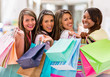 Foto: Happy group of female shoppers Happy group of female shoppers