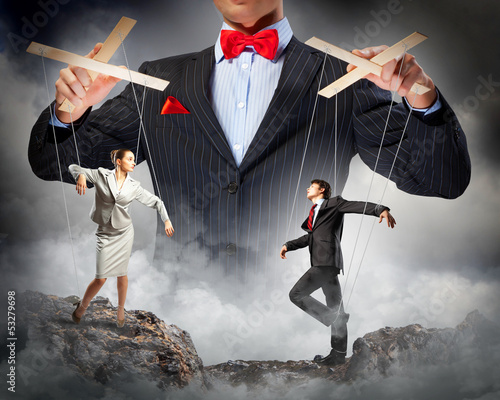 Photo: Businessman puppeteer Businessman puppeteer