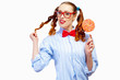 Photo: Young woman holding candy Young woman holding candy