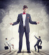 Photo: Businessman puppeteer Businessman puppeteer