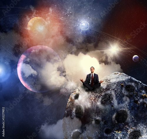Photo: business man meditating business man meditating