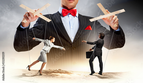 Photo: Businessman puppeteer Businessman puppeteer