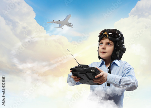 Photo: Little boy in pilot's hat Little boy in pilot's hat