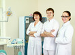 A medical doctors standing in dentist office