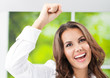Happy gesturing smiling young businesswoman