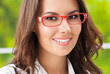 Foto: Young happy smiling businesswoman at office Young happy smiling businesswoman at office