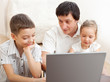 Family with laptop