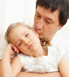 Photo: Father comforts a sad girl Father comforts a sad girl