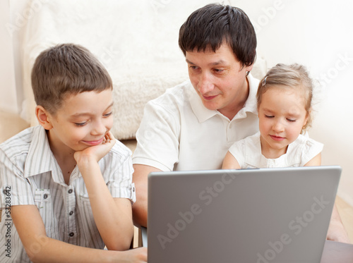 Photo: Family with laptop Family with laptop