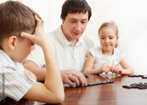 Photo: Family that plays dominoes Family that plays dominoes