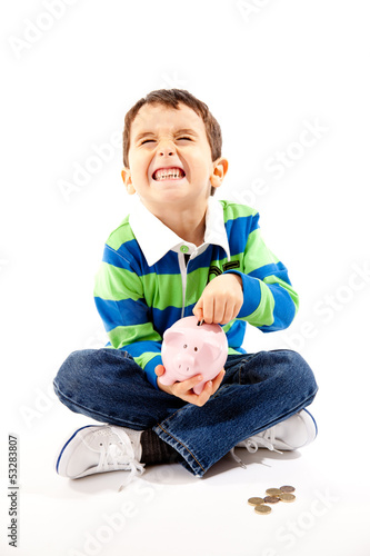 Photo: Small Boy With Piggy Bank Small Boy With Piggy Bank