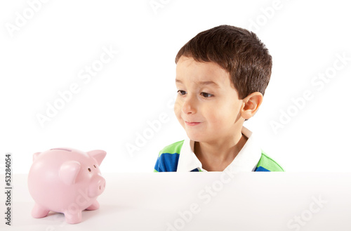 Photo: Small Boy With Piggy Bank Small Boy With Piggy Bank