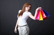shopping - Frau hält Einkaufstaschen