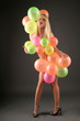 Frau mit Ballon
