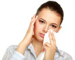 Sick woman blowing her nose, white background