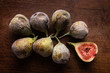 Figs in the box on wooden table