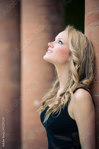 Photo: Beautiful girl outdoors intimate portrait. Beautiful girl outdoors intimate portrait.