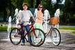 Photo: Urban biking - teens riding bikes in city Urban biking - teens riding bikes in city