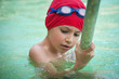 Photo: Kid in thermal swimming pool. Kid in thermal swimming pool.