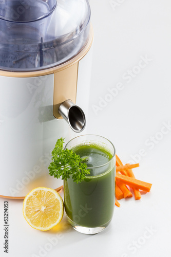 Photo: Healthy green vegetable juice with juice extractor Healthy green vegetable juice with juice extractor