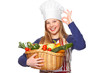 Photo: junior cook with vegetables smiling junior cook with vegetables smiling