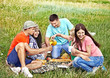 Group people on picnic.