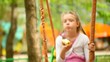 Video: Little girl eating an apple Little girl eating an apple