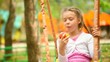 Video: Little girl eating an apple Little girl eating an apple